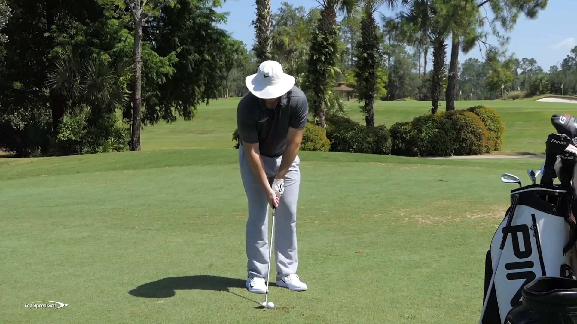 Demonstration of proper stance for wedge shots