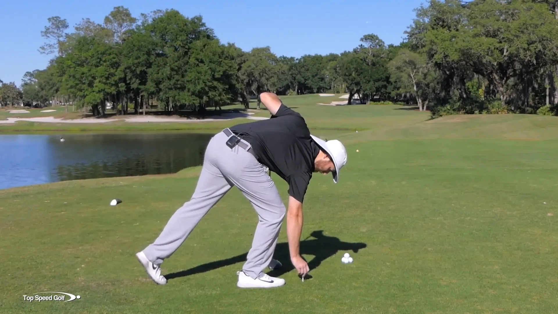 Creating a slingshot effect with hands and club