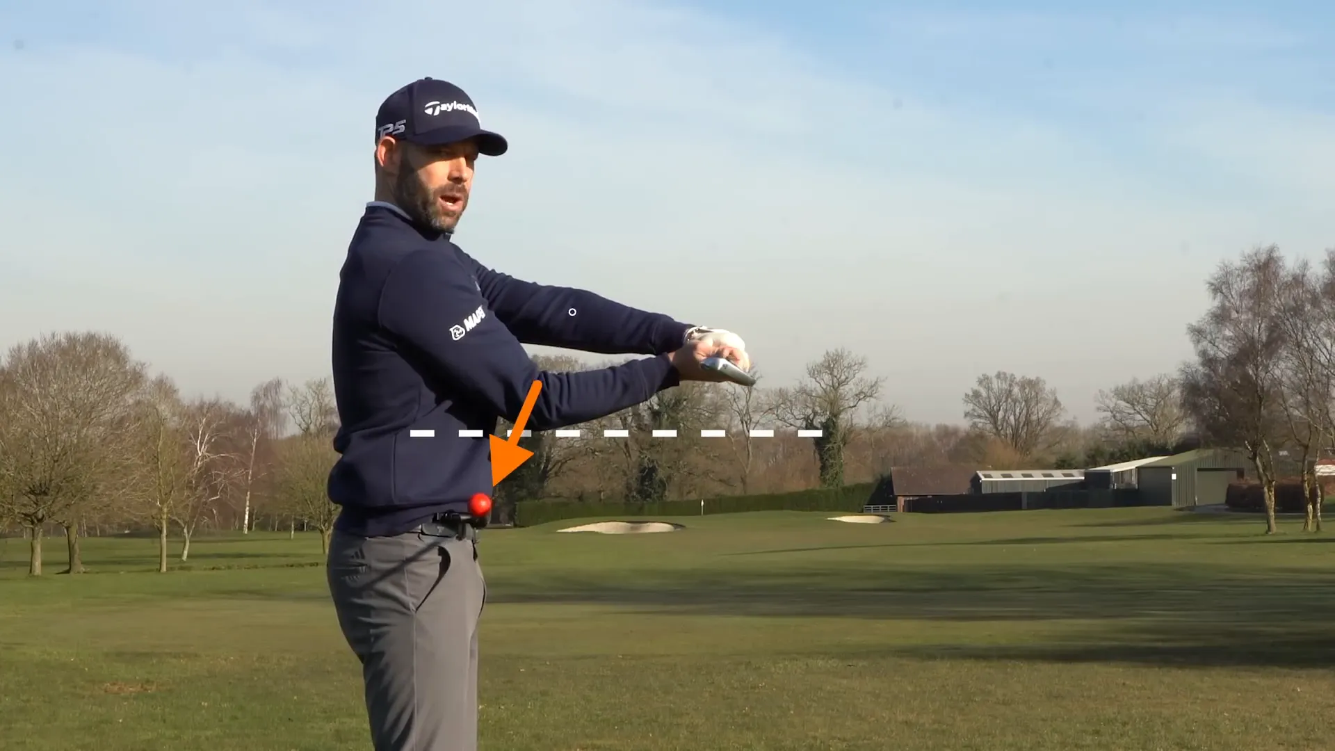 Demonstrating elbow position in the delivery stance