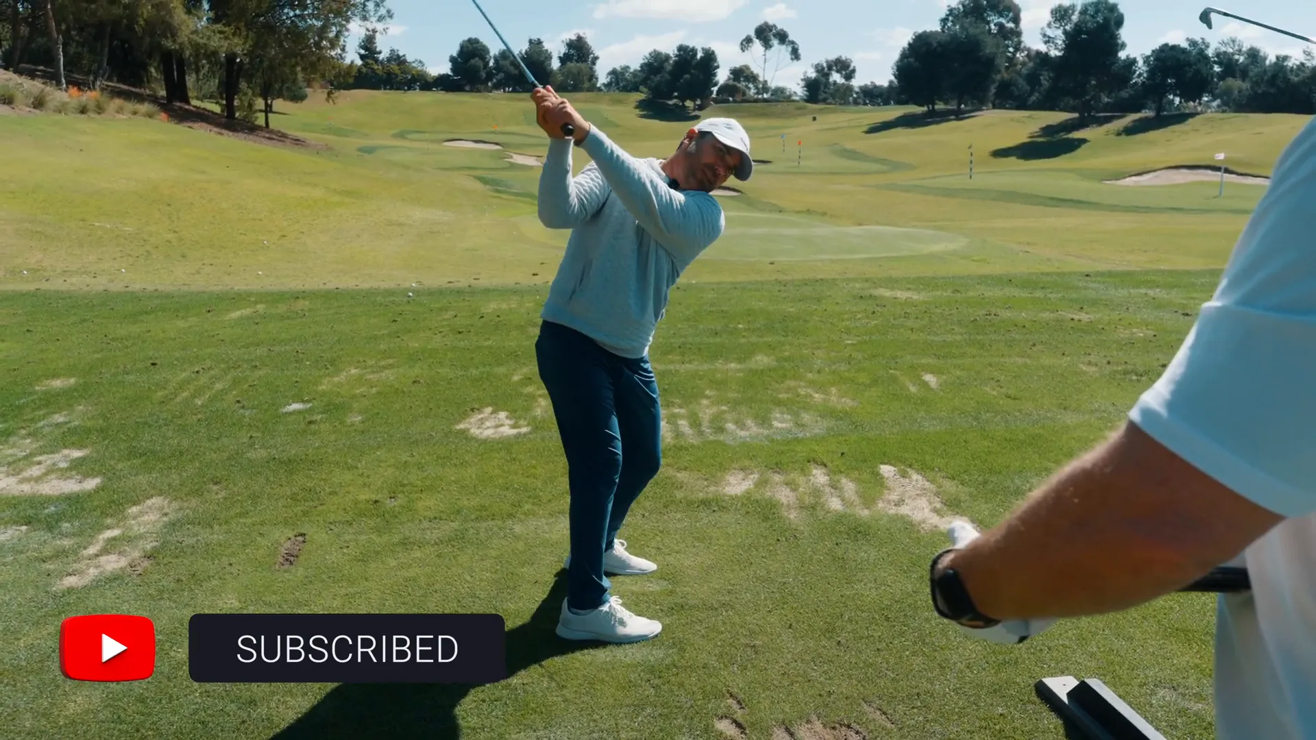 Demonstration of hand alignment in the swing