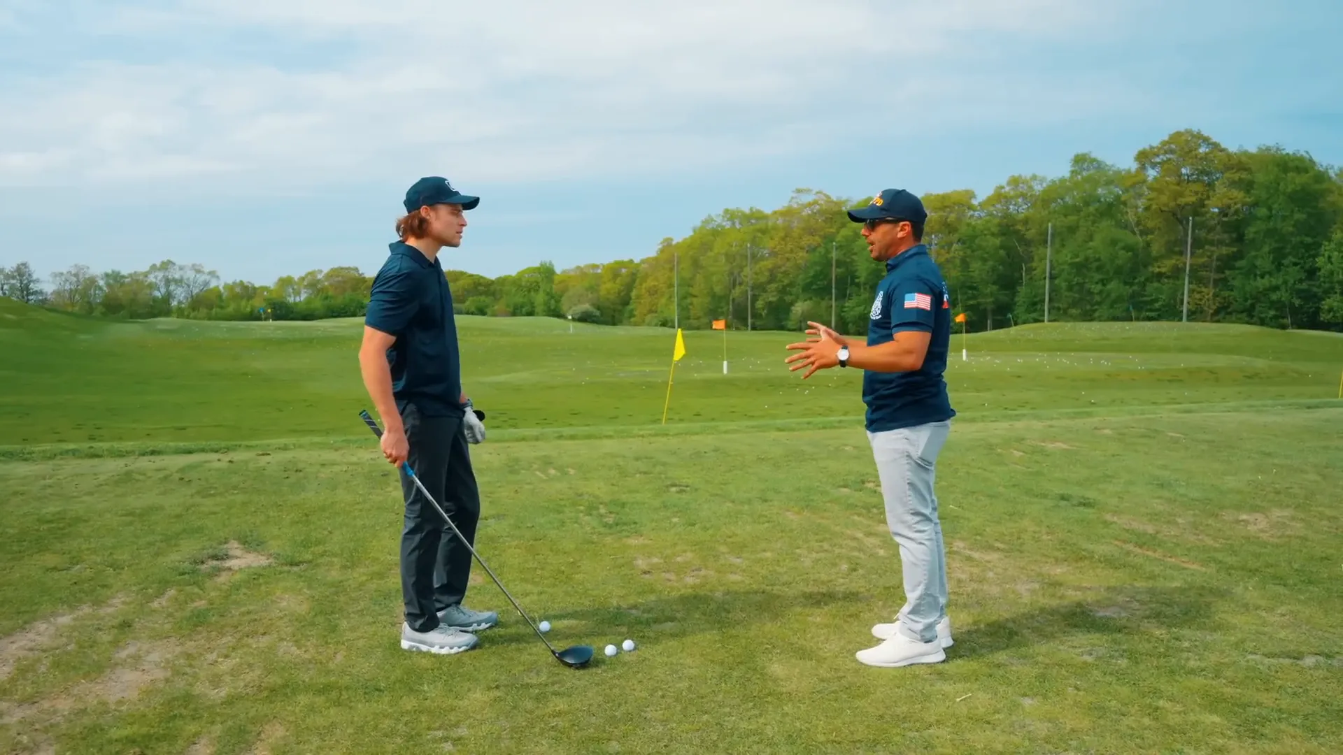 Golf instructor explaining downswing position