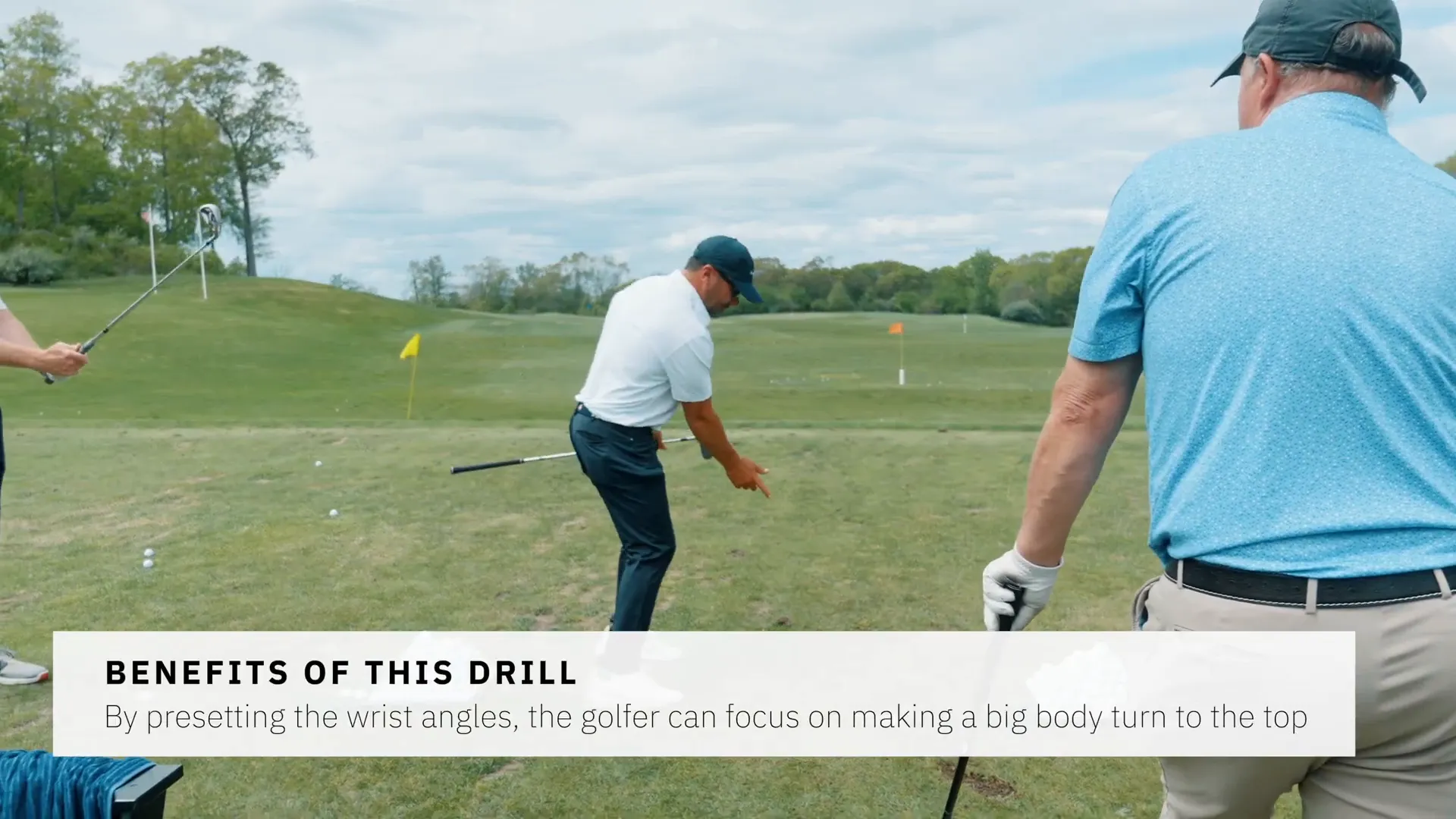 Golfer performing hinge and set drill to improve arm and wrist position at the top of backswing