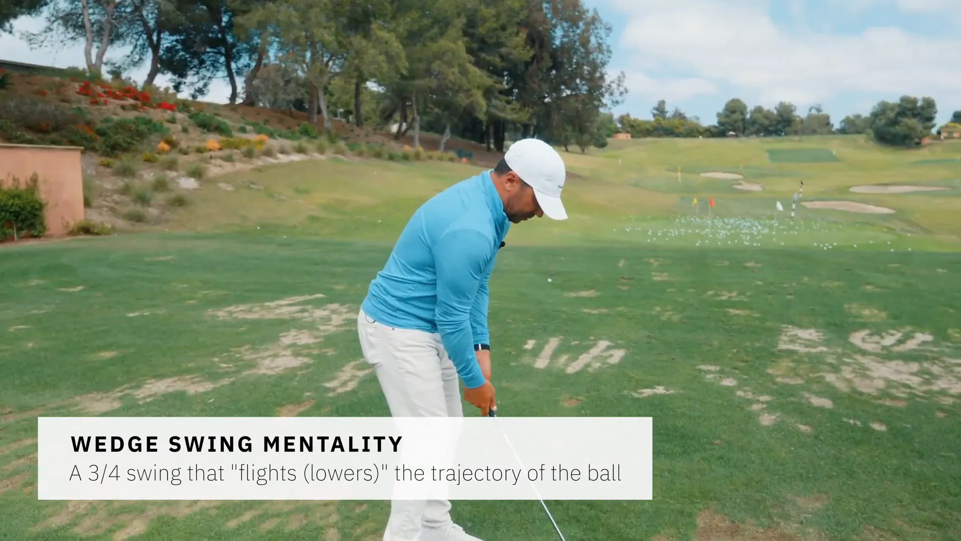 Sand wedge swing producing low ball flight