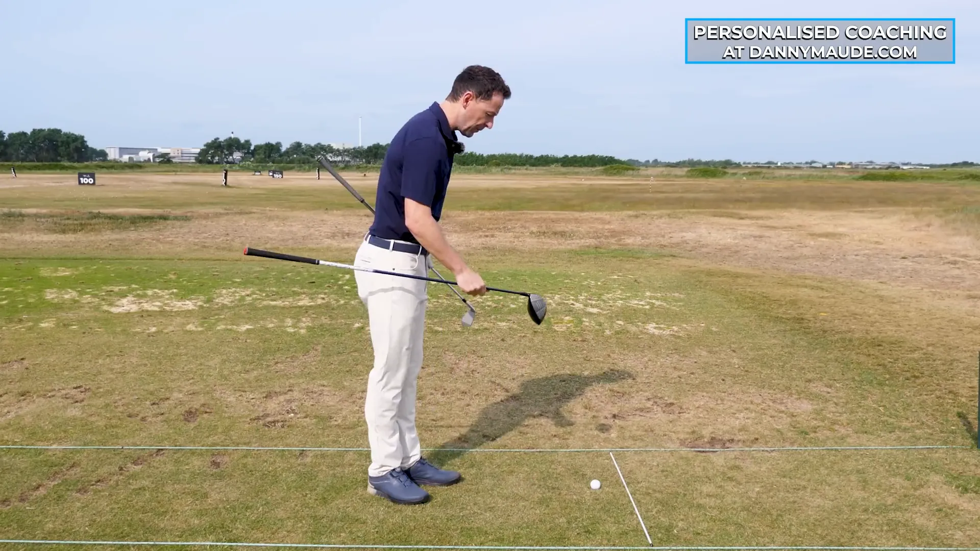 Mark hitting a driver shot down the middle