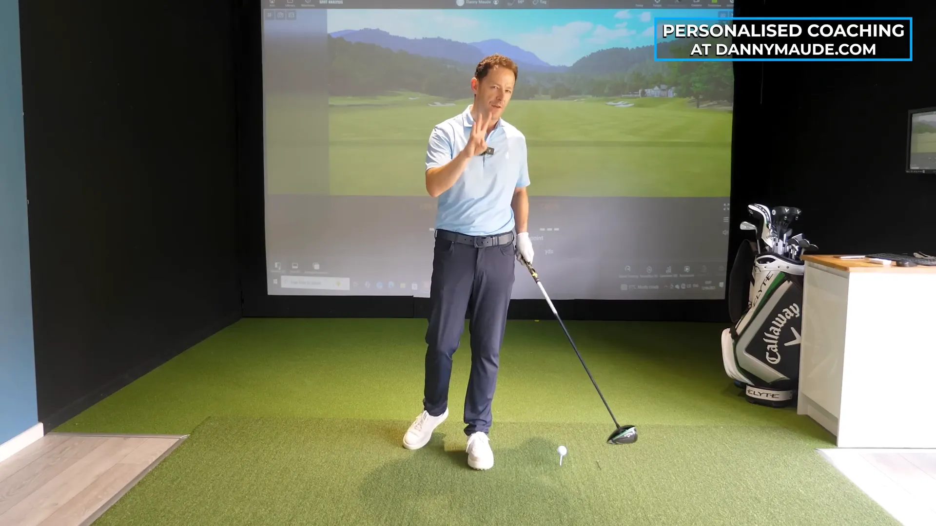Danny Maude hitting a powerful golf drive