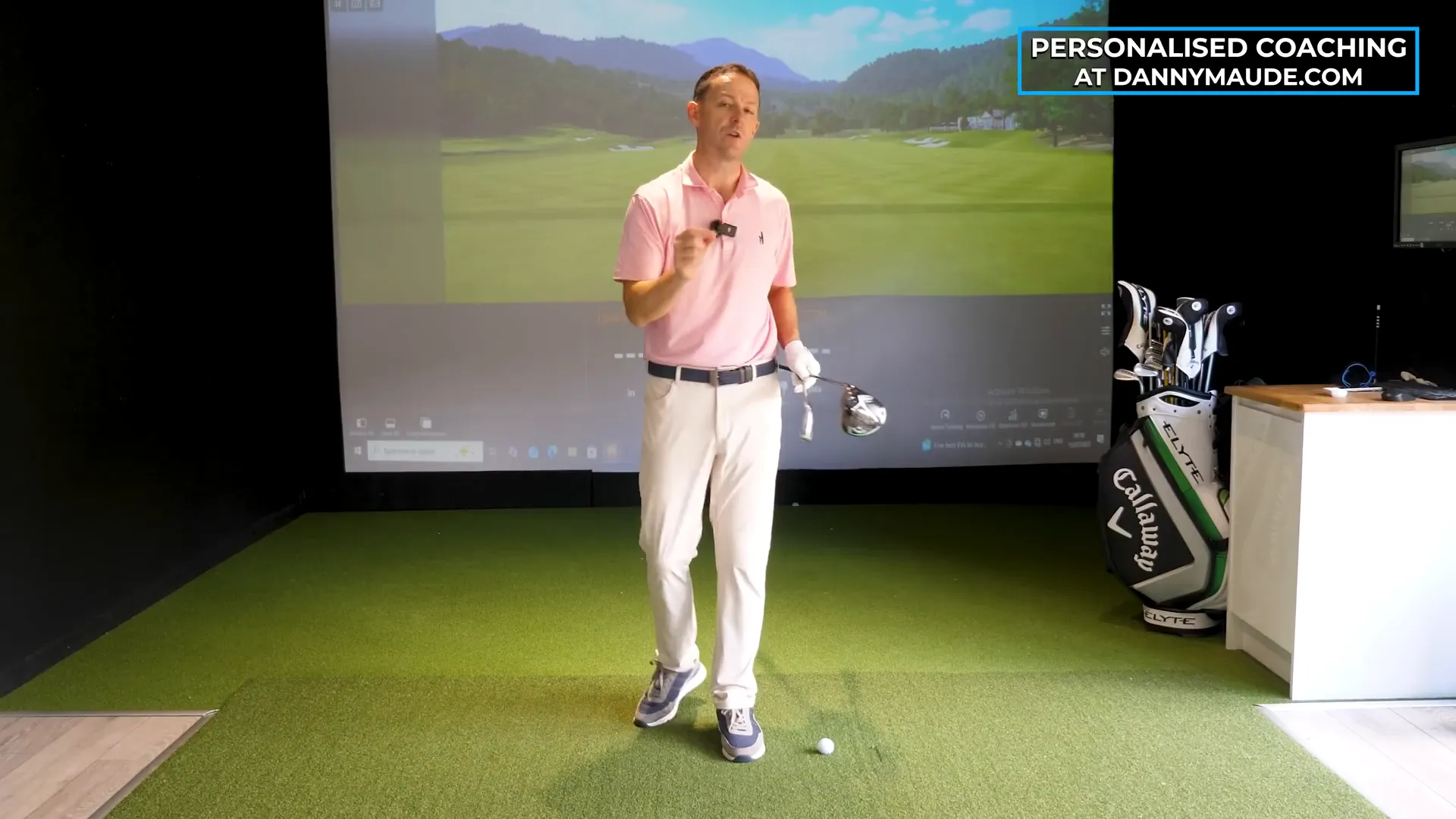 Relaxed golfer swinging driver effortlessly