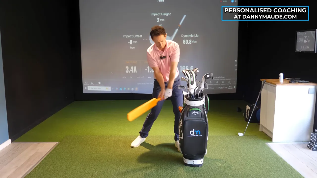 Imagine the club like a cricket bat — full shaft and face hitting a flat surface