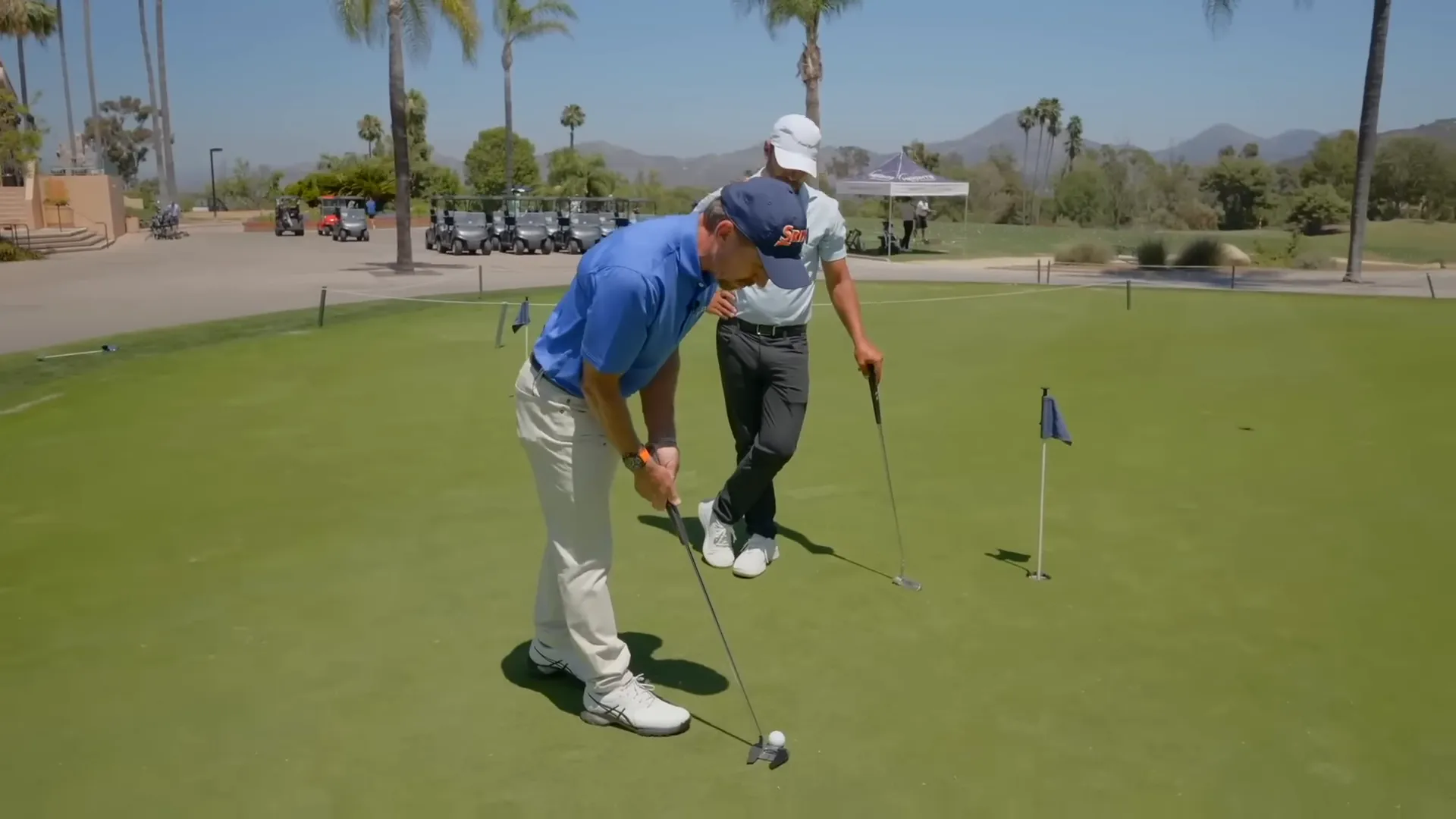 Eyes aligned over the inside edge of the golf ball for a clear down-the-line view