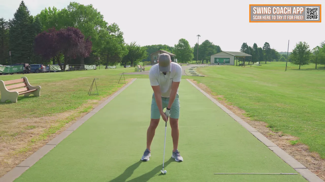 Combining grip maintenance and relaxed arms during a swing