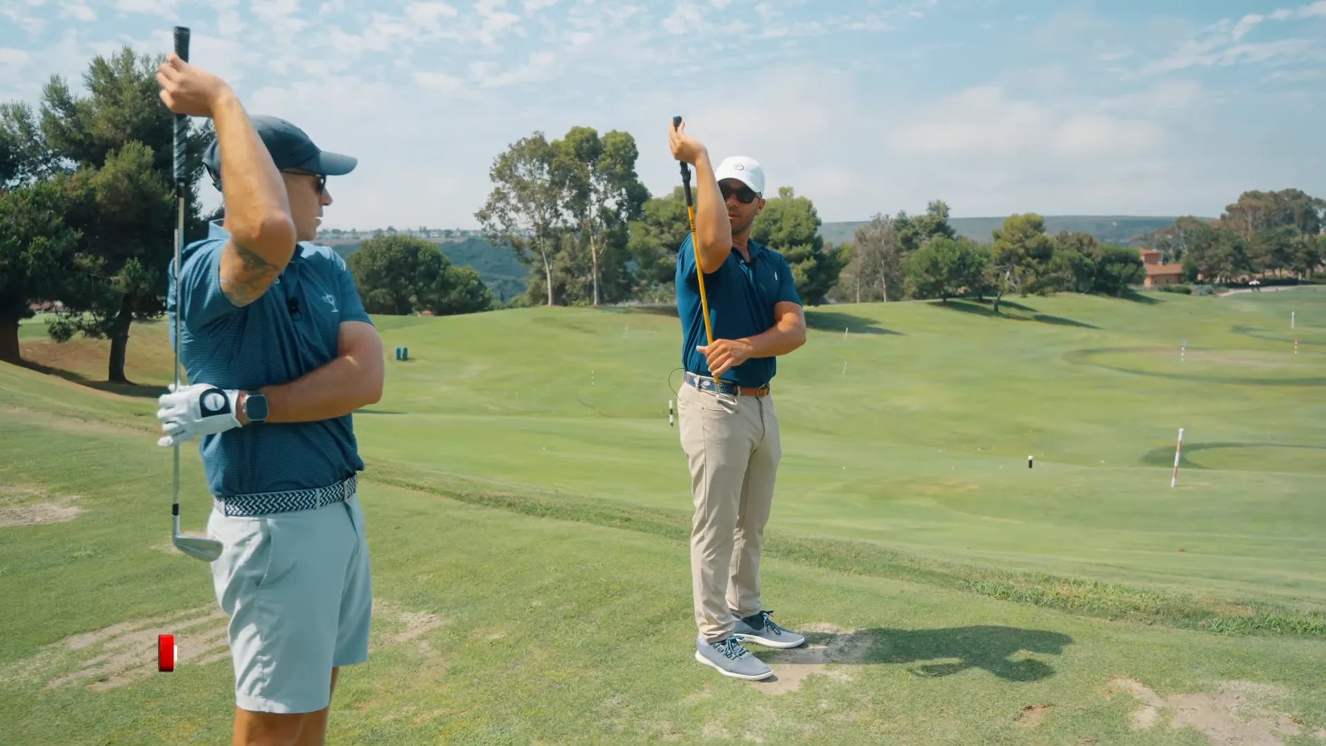 Demonstration of the trail arm drill with the club behind the tricep