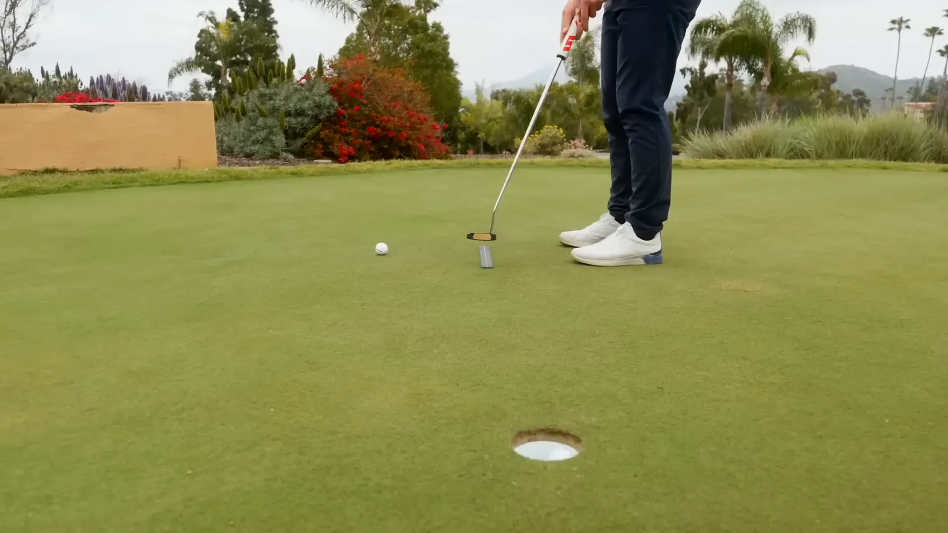 Player executing a straight back five-inch stroke during practice