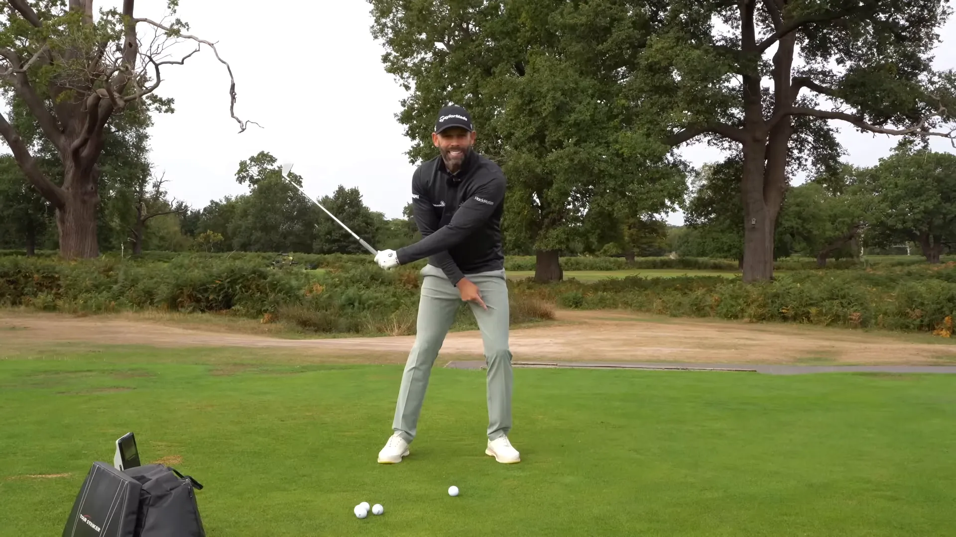 Final position showing forward pressure at impact and solid strike