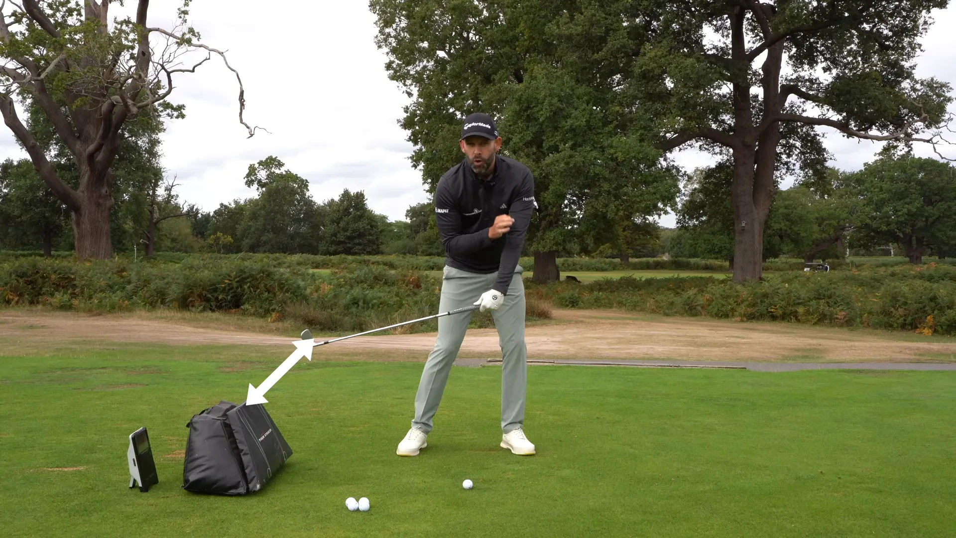 coach showing weight shift forward to create lag in golf swing