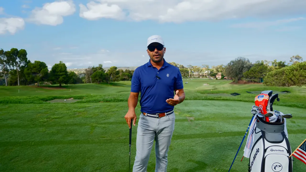 Instructor demonstrating the 'beach ball' analogy while addressing the camera