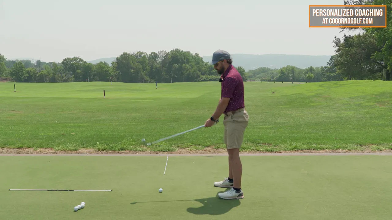 Player holding shoulder-high finish position with club toe on top of heel for face check