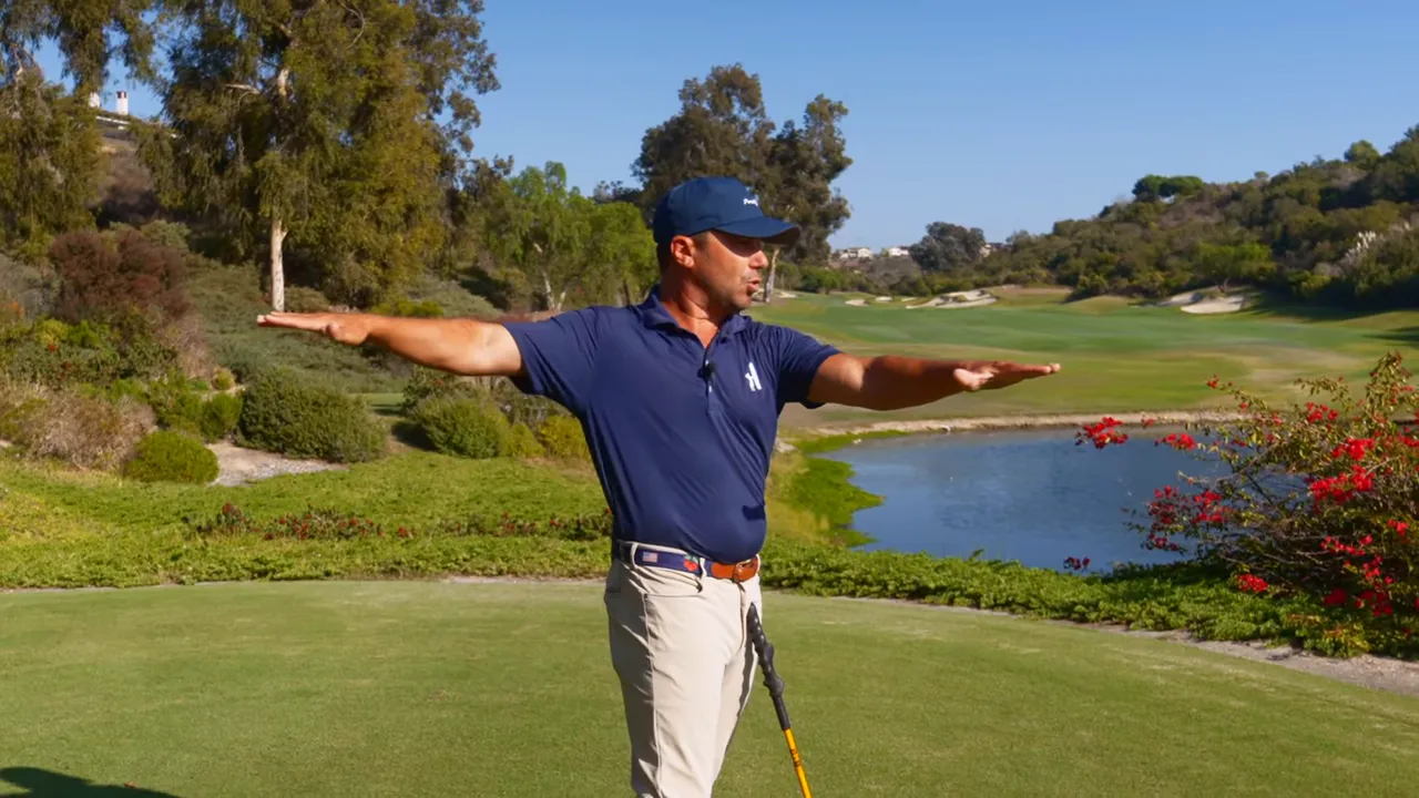 Instructor pointing to hands to illustrate direction relative to body turn