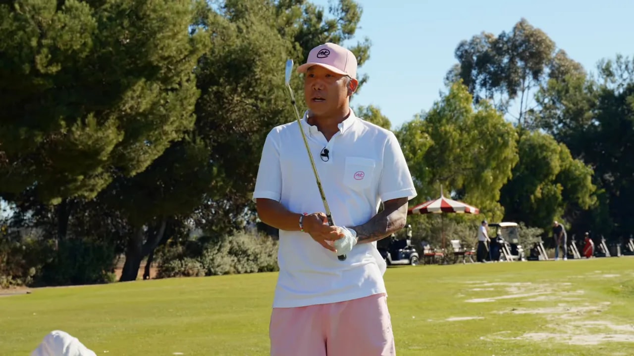 Instructor demonstrating golf grip