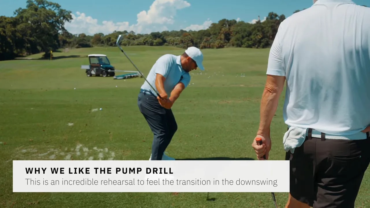 pump drill mid-downswing with coach observing — rehearsal to feel the transition