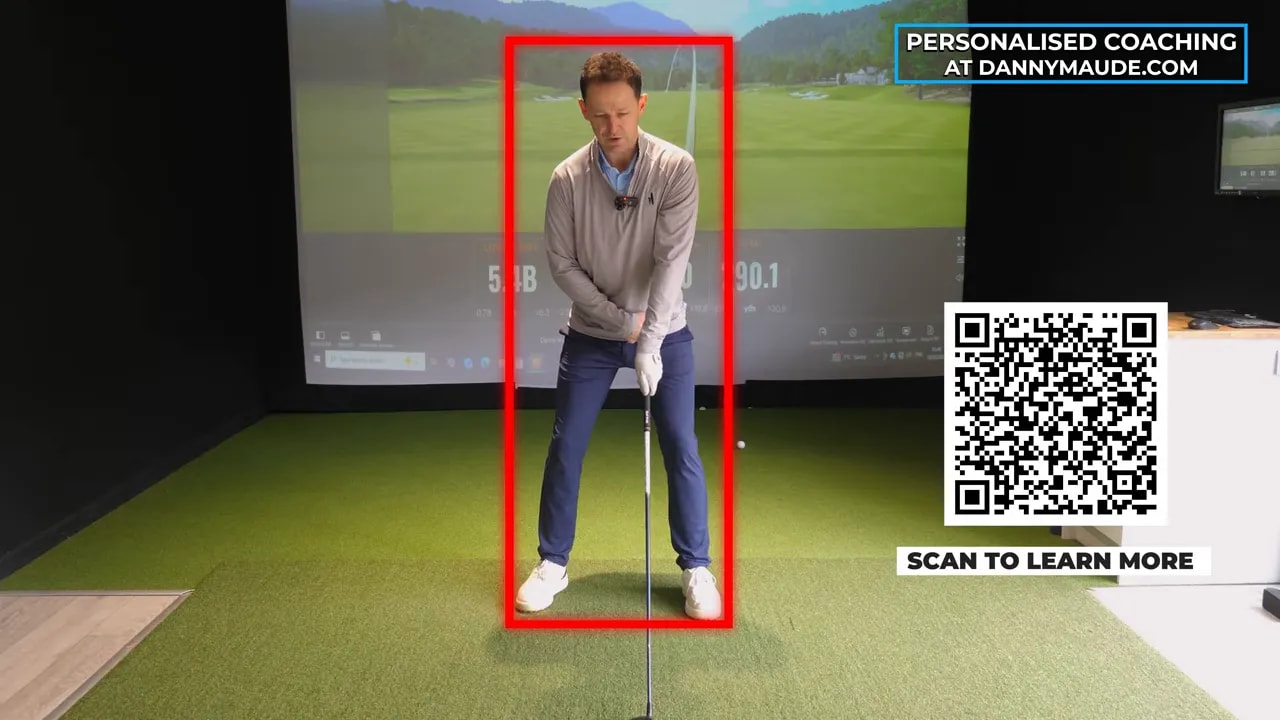 Instructor at driver address with a red rectangle overlay showing the body 'box' and hip alignment