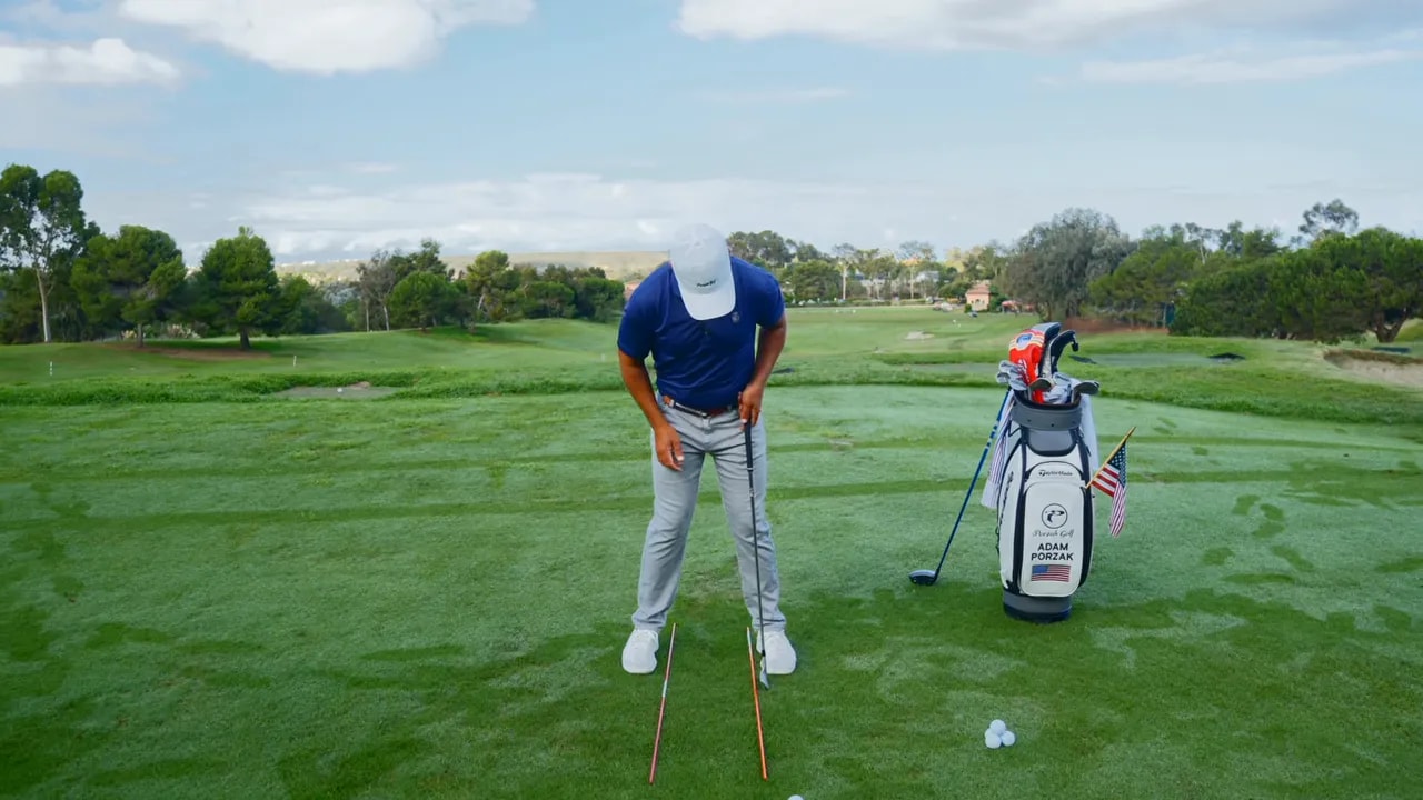 Golfer showing hip bump checkpoint with focus on centered posture and braced rotation