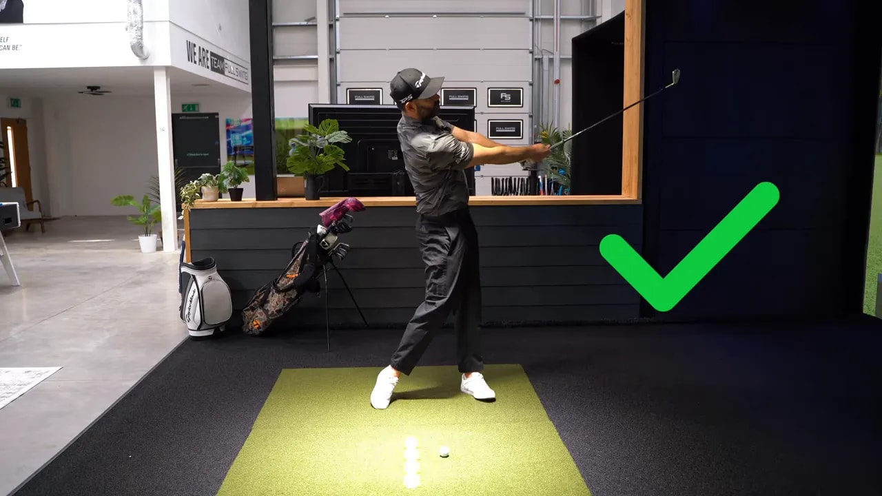 golfer demonstrating correct extension and follow-through with chest facing target and green check mark