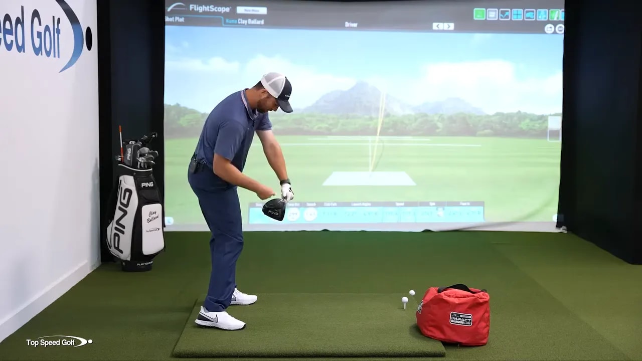 Simulator image of golfer in downswing transition showing forearm relationship near last parallel with FlightScope