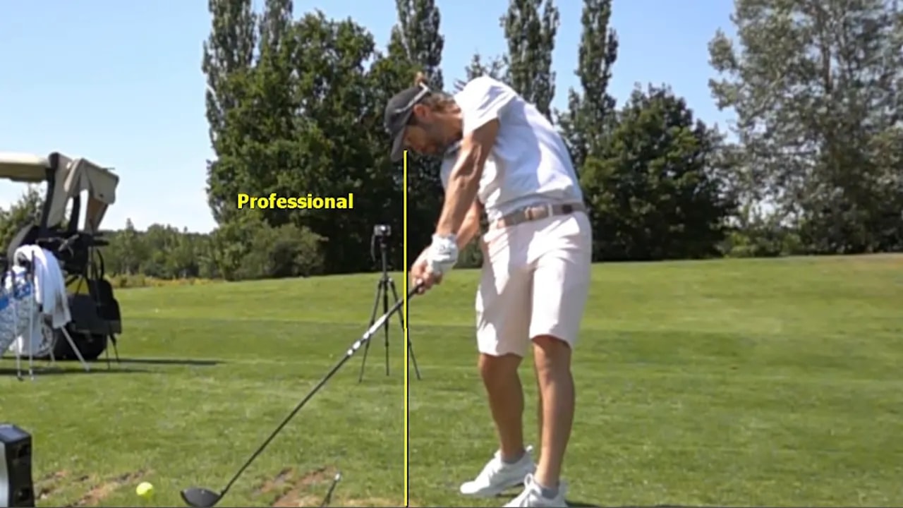 Golfer captured at impact with a high lead chest and tucked trail elbow, vertical guide line marking chest height