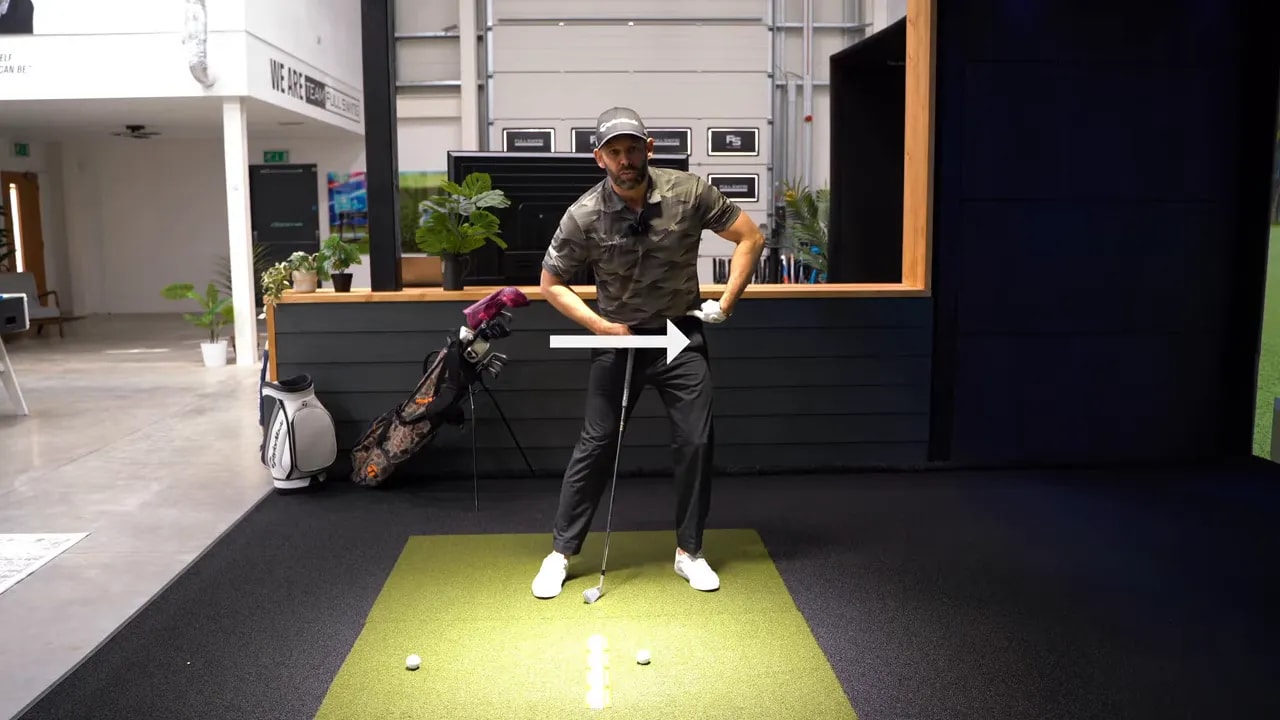 Instructor demonstrating lateral hip shift toward target with arrow showing movement