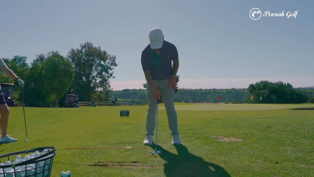 Alignment line drill frame showing where hands should arrive during downswing transition