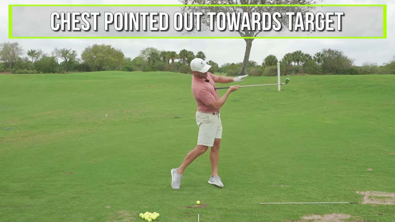 Golfer showing chest pointing out toward the target during the through-swing