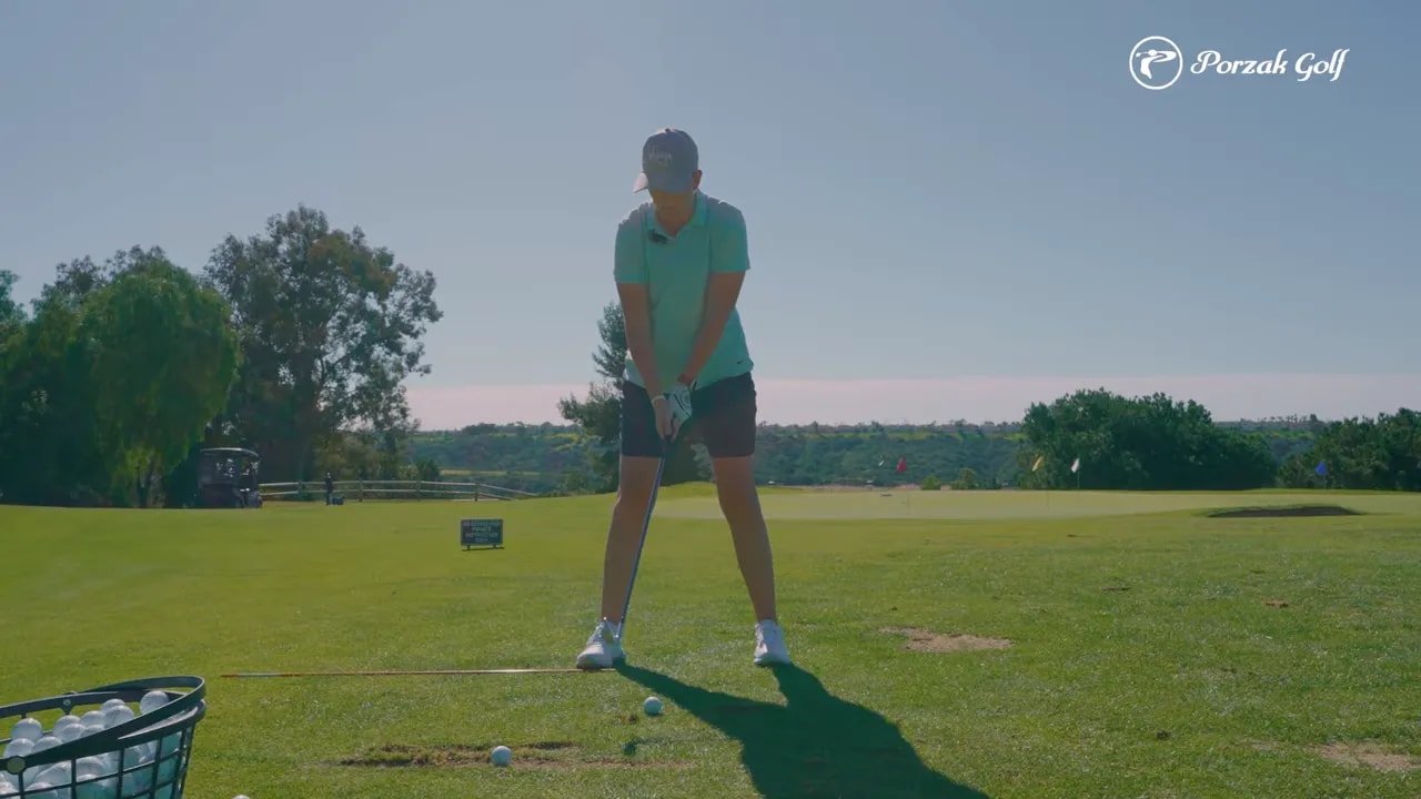 Clear view of boundary-line setup showing where hands should move during the takeaway drill