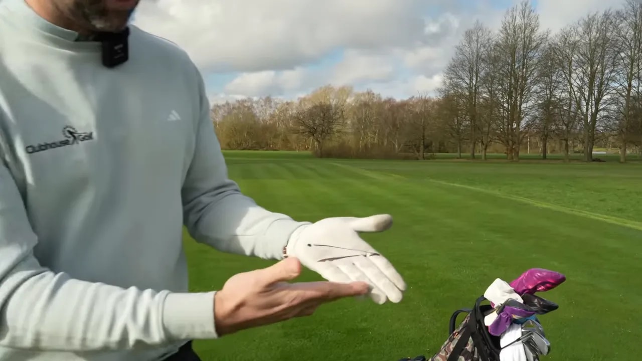 Close-up of marked glove grip placement lines for testing handle position