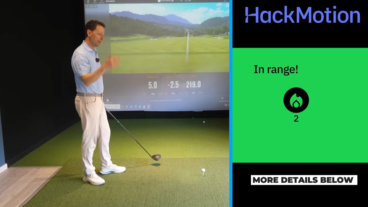 Coach in a golf simulator explaining driver timing while HackMotion indicates the ball is in range