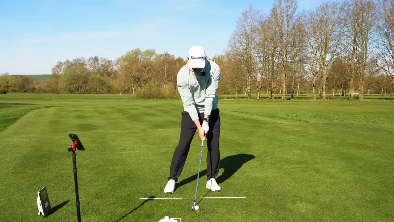 Golf 9-to-3 drill finish position on the practice range