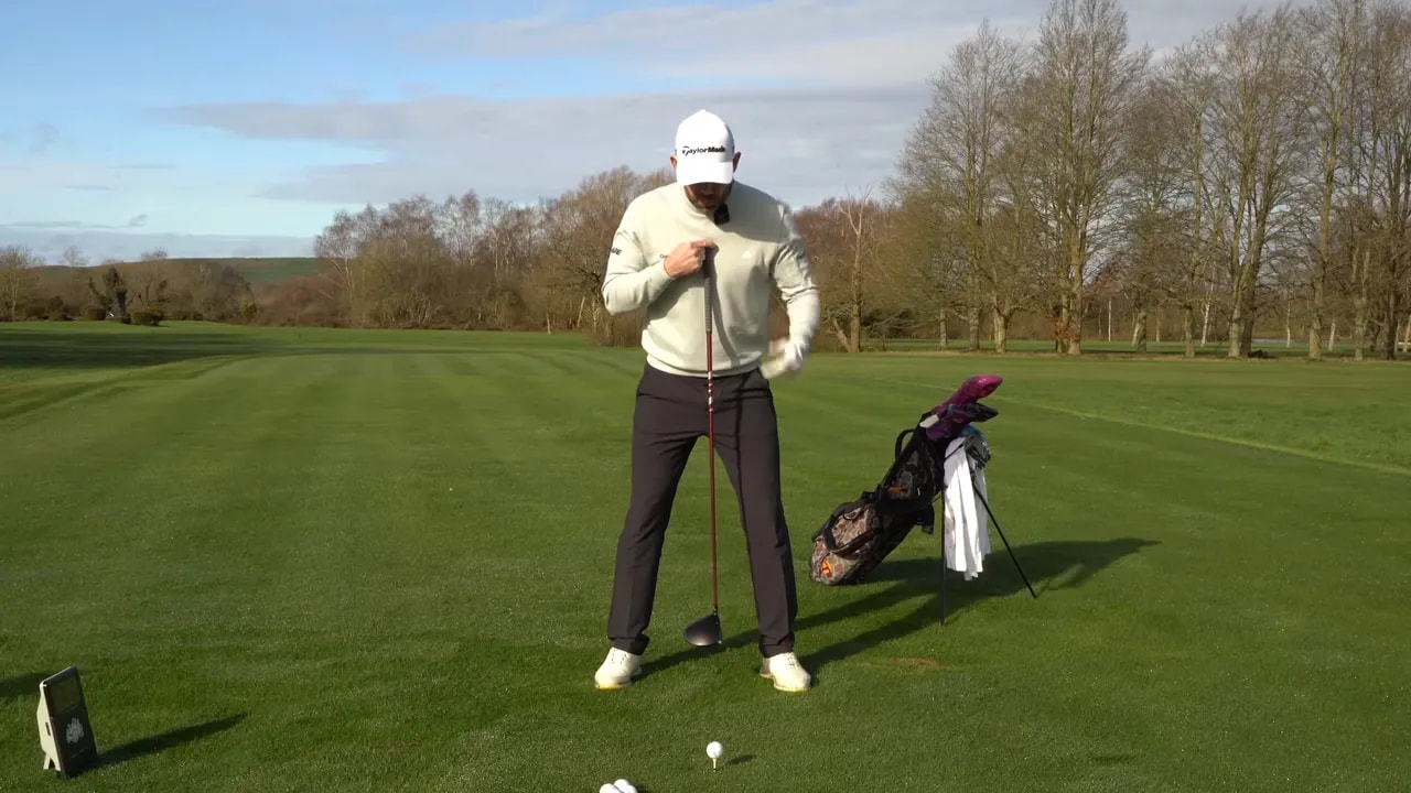 Golfer demonstrating a heavier-to-lighter transition with a push-away feel