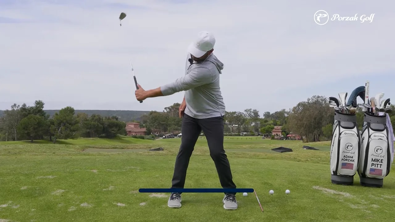 Golfer showing halfway-back set position with early wrist set on the driving range