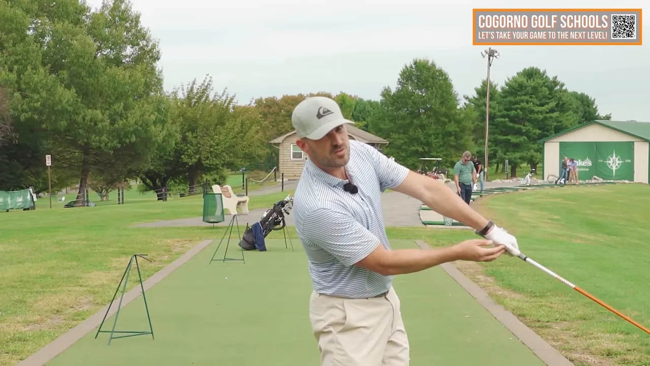 Close view of golf instructor showing lead arm and forearm position for driver release squaring