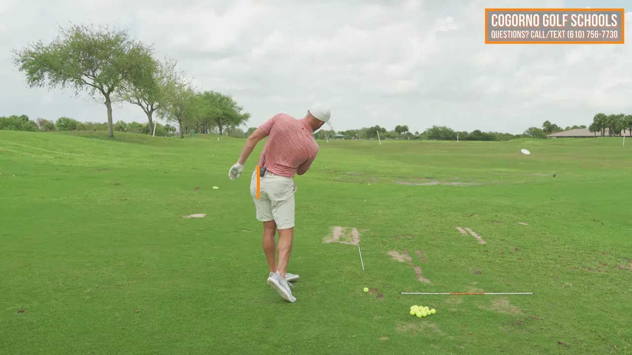 Trail-side down focus shown with orange marker during stay down through the ball drill