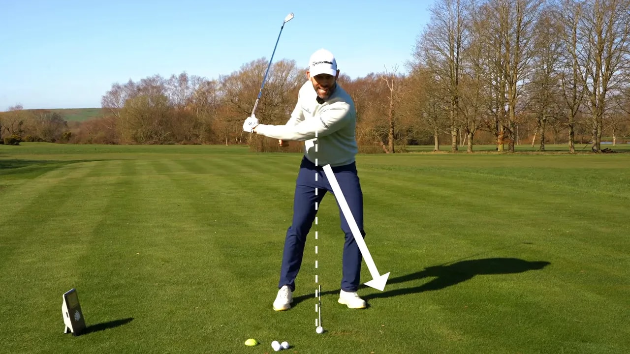 Golfer using visual cue to guide pressure shifting from trail side to lead side in transition