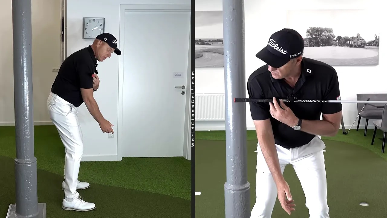 Golfer performing a wall drill with trail shoulder turn early to create hand depth