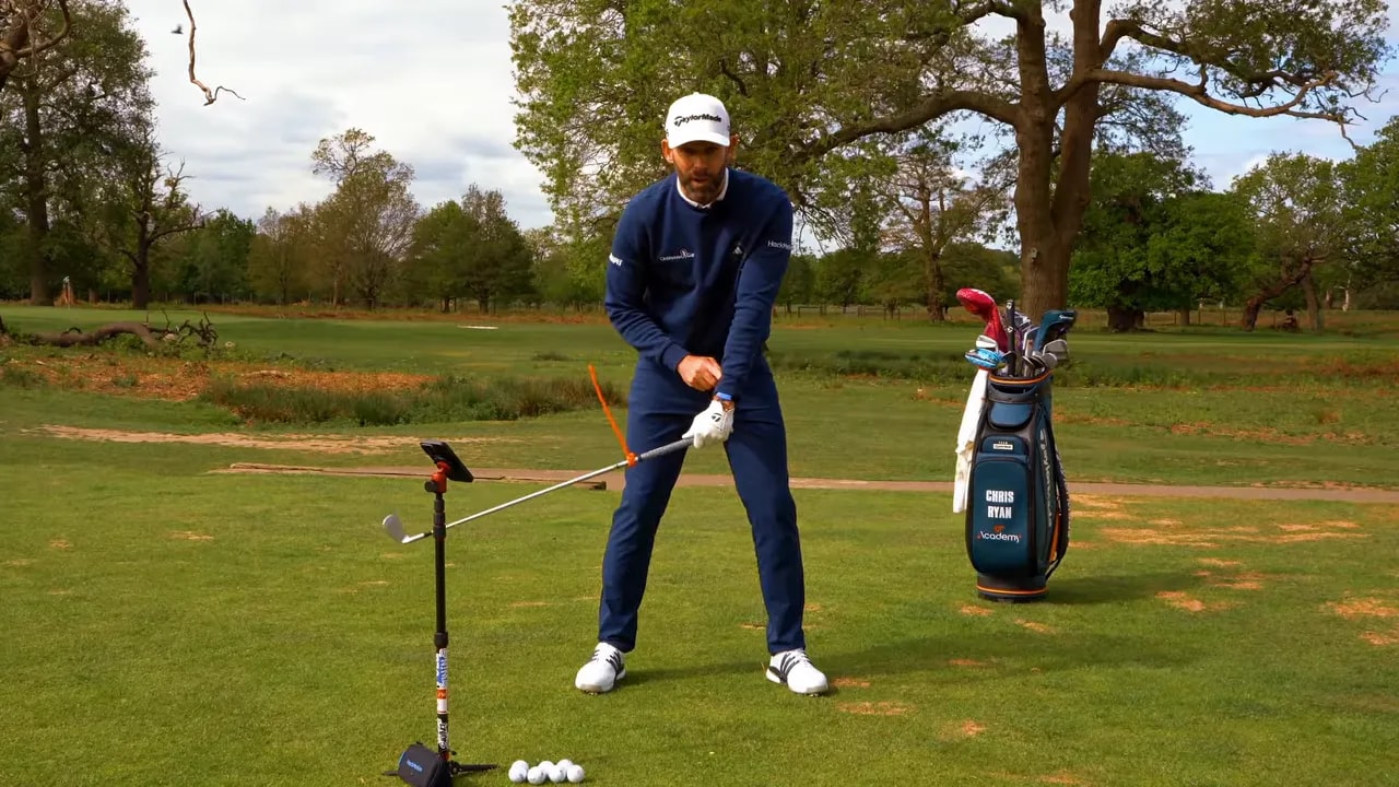 Golfer demonstrating clubface squaring release sequence with forearm rotation