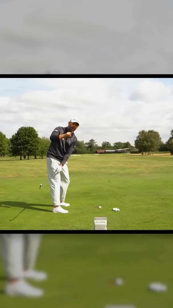 Golfer demonstrating arms moving down and behind during iron transition with chest staying back for a draw