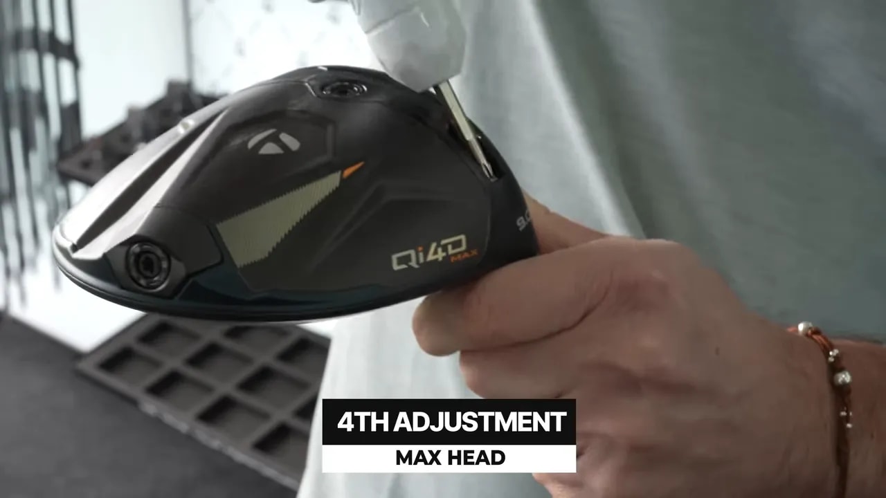 Max head adjustment shown on a TaylorMade Qi4D driver during a golf fitting