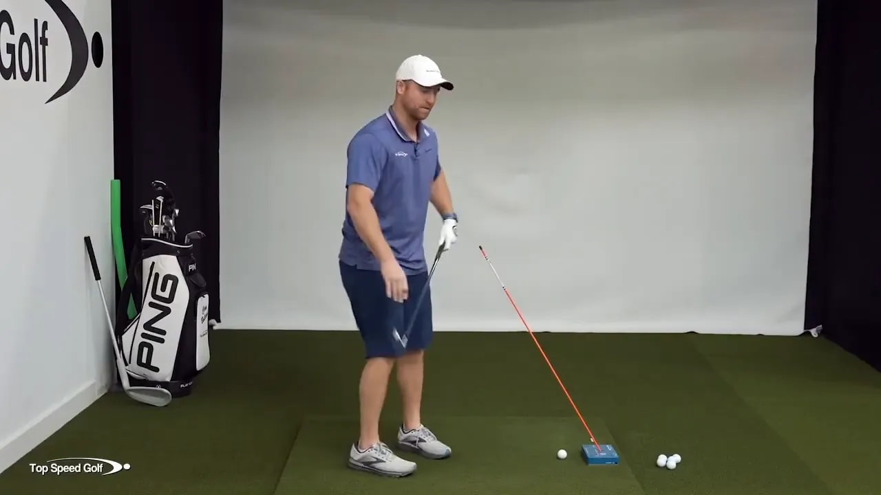 Posture and rotation drill demonstrating forward shaft lean delivery