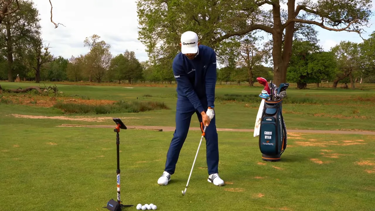 Golfer practicing slow clubface squaring with forearm rotation
