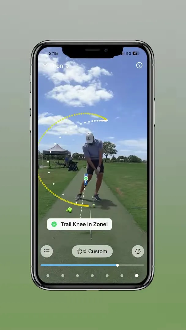 Smartphone face-on swing recording with trail knee in zone overlay for the downswing drill