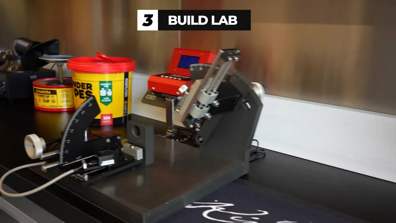 Build Lab workstation with club assembly equipment at TaylorMade Kingdom