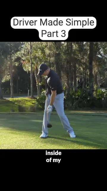 golfer paused with club dropping down near the inside of the lead leg