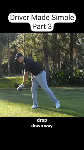 golfer demonstrating club dropping outside the trail side foot during an exaggerated sway