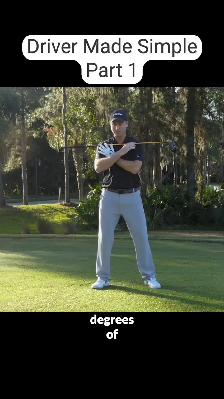 golfer turned to the trail side with club across shoulders showing backswing rotation